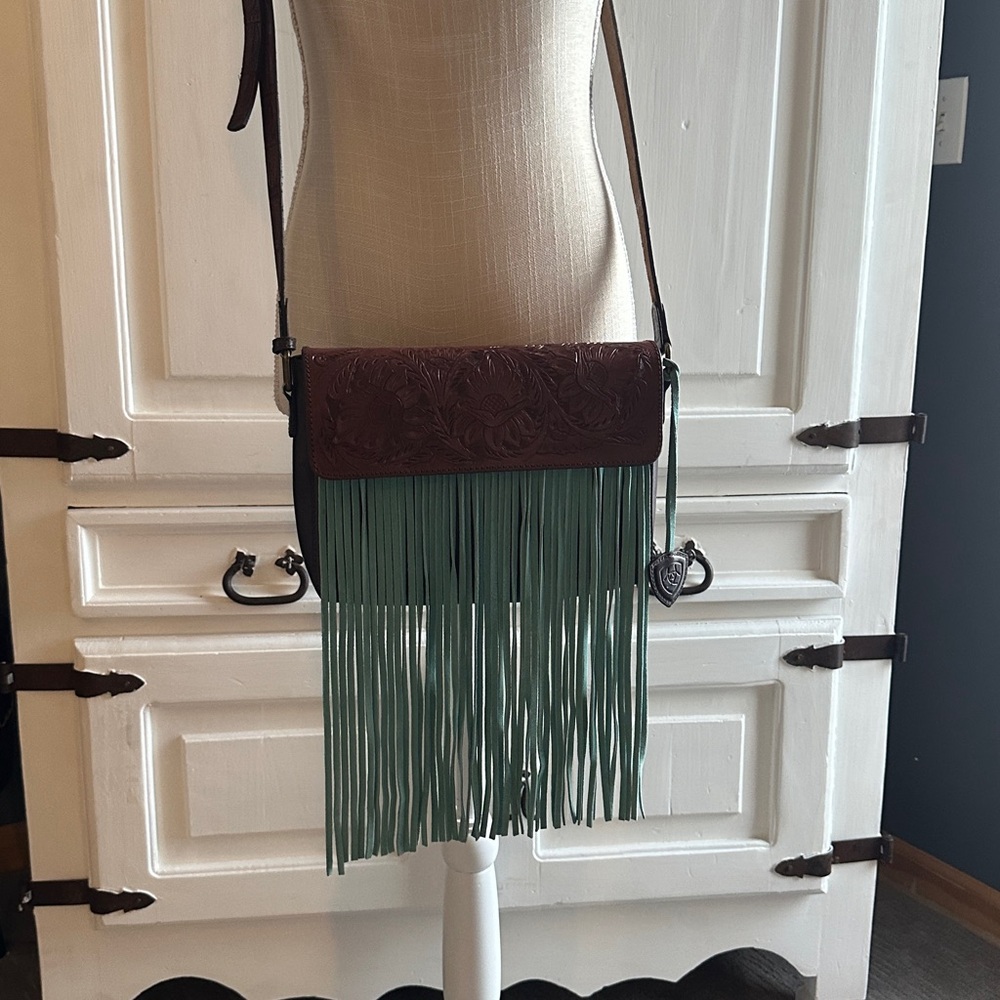 Ariat leather crossbody with fringe.